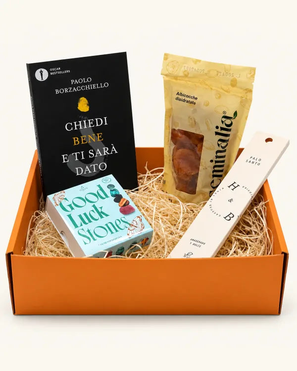 Box arancione con Chiedi bene e ti sarà dato, albicocche disidratate, Good Luck Stones e palo santo